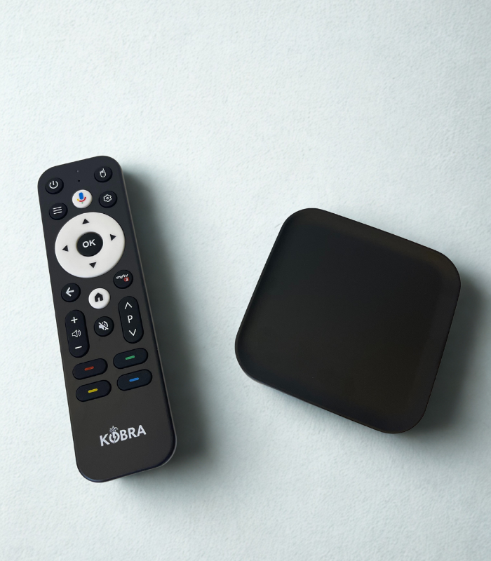 Black remote control with Kobra branding next to a black rectangular device on a light gray background
